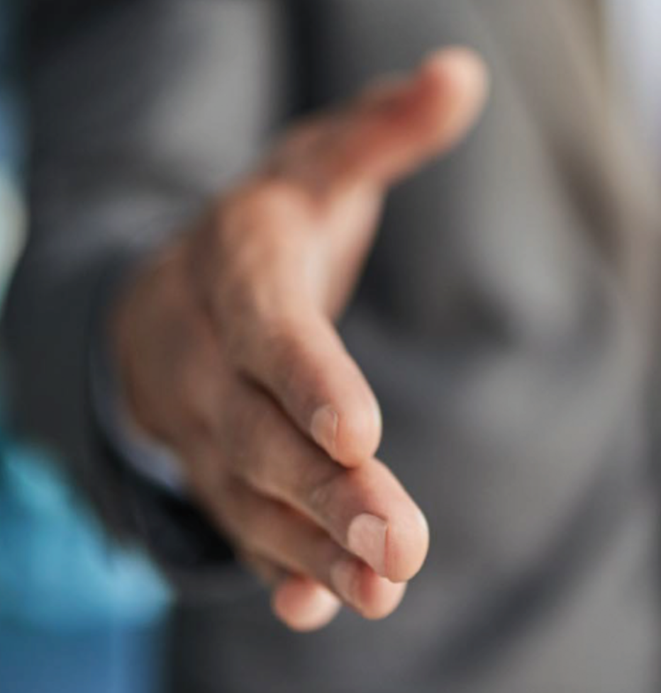 person with outstretched hand for a handshake