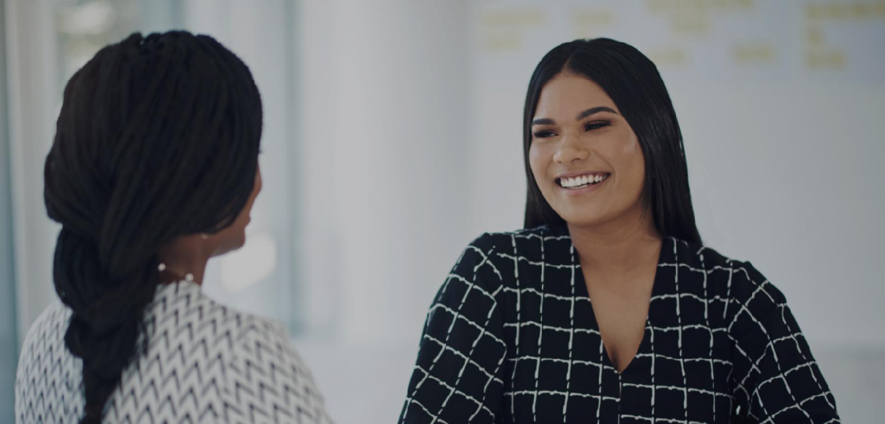 Midland employee smiling at a customer